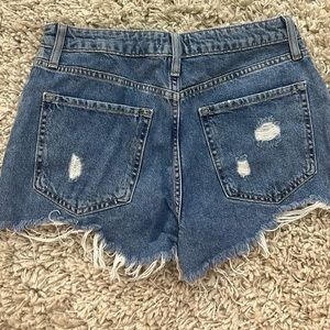 Distressed blue jean shorts Size 27